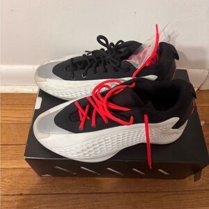 Adidas Black and White Shoes with Red Accents